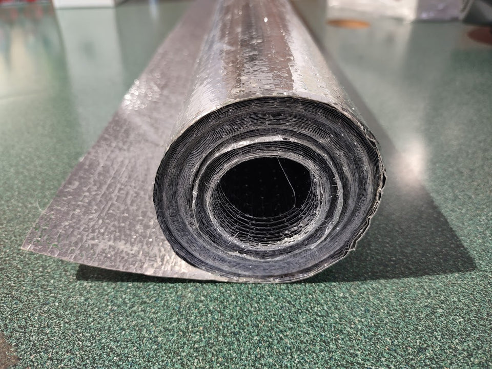 Perforated heat reflective foil sauna vapor barrier